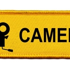 DCP 331 cameraman jaune noir